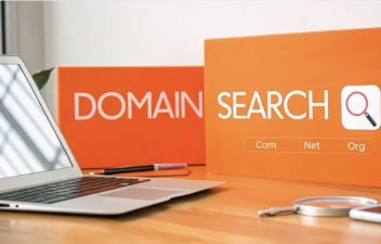 featured-cldy-domain-search-using-laptop-orange-bg